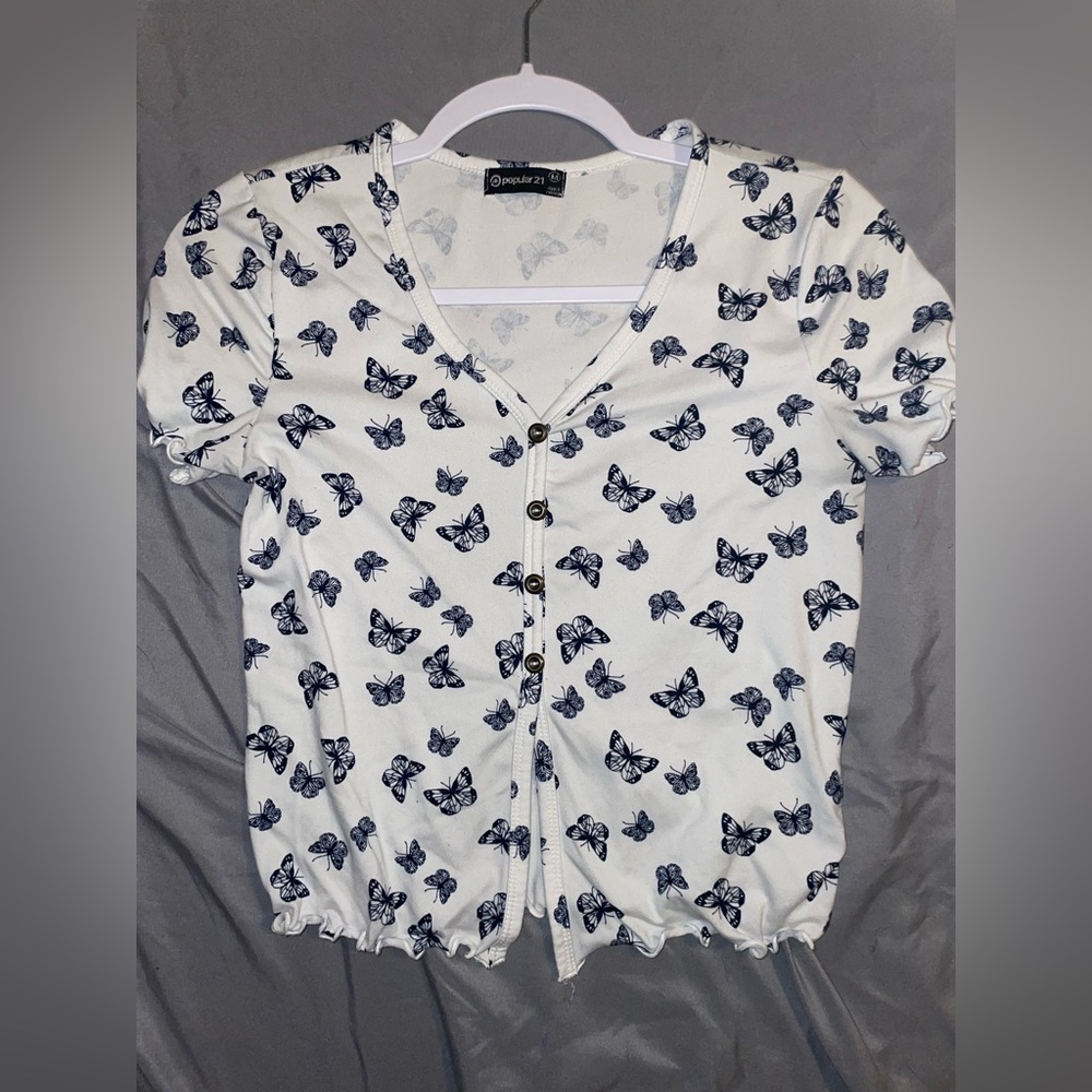 White crop top with blue butterfly pattern